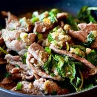 薄荷牛肉 Stir Fried Beef W/Mint Leaves · Round eye beef, thin sliced, wok tossed with hand picked fresh mint leaves.