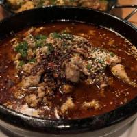 水煮肉片 Boiled Pork In Chili Oil · Signature Southwestern Chinese dish. Sliced pork in chili oil, assorted vegetables, topped w...