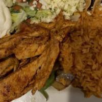 Lunch Fajitas · Gluten free. Chicken, steak, or veggie. Served with rice beans, lettuce, shredded cheese, so...