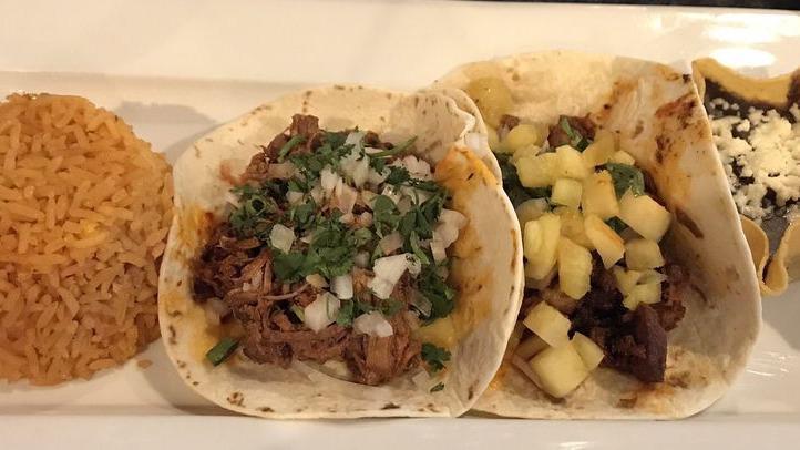 Toluca Tacos · Gluten free. Select two, served with rice and beans. Choices: chicken, steak, carnitas, al pastor, barbacoa, veggie.
