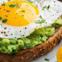 Avocado Toast · Toast, Avocado Tomato, Feta Cheese, 2 Egg Served with Home dries or Hash Brows