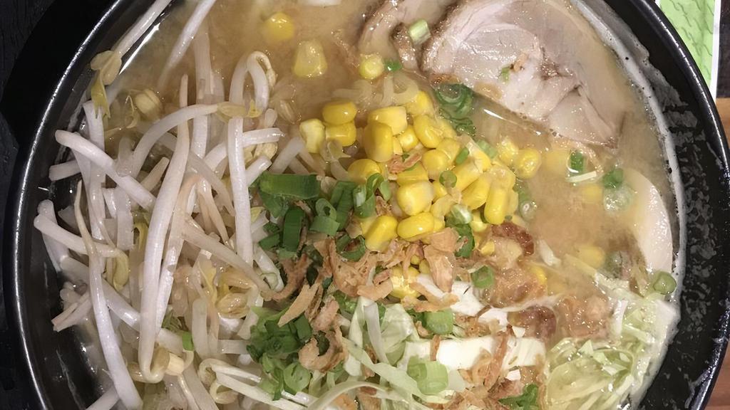 Miso Ramen · Miso paste soup, topped with roasted pork (charshu), bean sprouts, fish cake, kernel corn, seasoned boiled egg and chopped scallion.