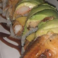 Dinosaur Roll · Soft shell crab tempura inside, topped with eel, avocado & spicy crab.