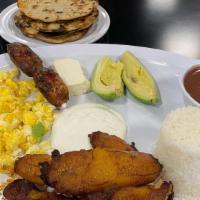 Desyuno Salvadoreño · Two sunny side up eggs, fried plantains, fresh cheese, rice, refried beans, source cream, ch...