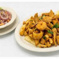 Jalea Mixta · Fish and seafood marinated with onions, tomatoes, and deep-fried.