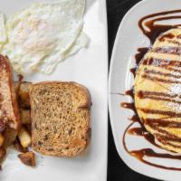 Double Feature Plate · Two eggs, two sausage or bacon and two pancakes, toast or home fries.