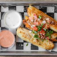 Torpedos · A fun take on a classic taquito. Flour tortillas rolled up with choice of meat and cheese an...