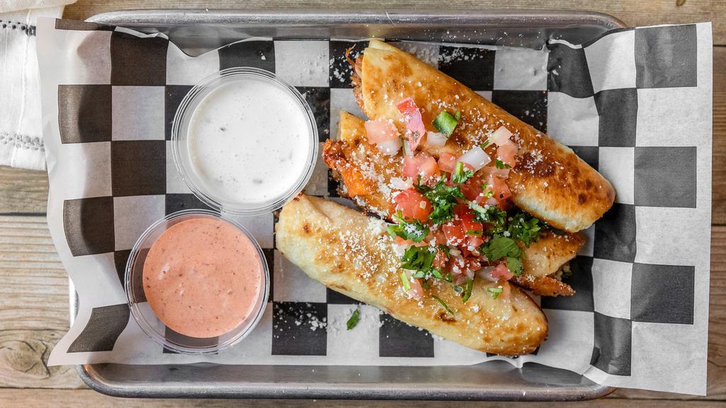 Torpedos · A fun take on a classic taquito. Flour tortillas rolled up with choice of meat and cheese and pan fried. Topped with cotija cheese, pico de gallo, cilantro, and a side of chipotle lime crema. Choose up to three meats.
