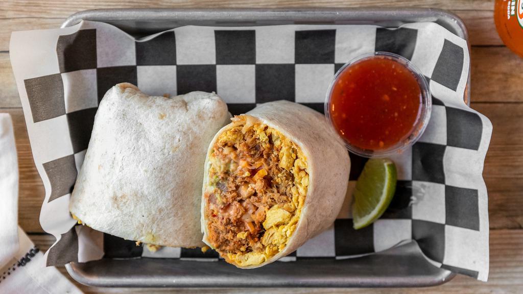 Breakfast Burrito · Fluffy eggs, Mexican cheese blend, fresh pico de gallo, guacamole, chipotle lime crema, and choice of meat all wrapped in a warm flour. Can be made into a burrito bowl. No flour tortilla.