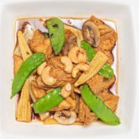 Spicy Tofu · Medium spicy. Golden fried tofu, mushroom, bamboo shoot, baby corn, snow pea, cashew, chili ...