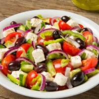Greek Salad · Season vegetables served with feta cheese. Add protein for an additional charge.