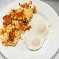 2 Eggs With Corned Beef Hash · Eggs are prepared to your liking. Served with fries.