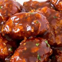 Bang Bang Chicken Bites · All white meat chicken lightly coated deep fried & tossed in choice of sauce.