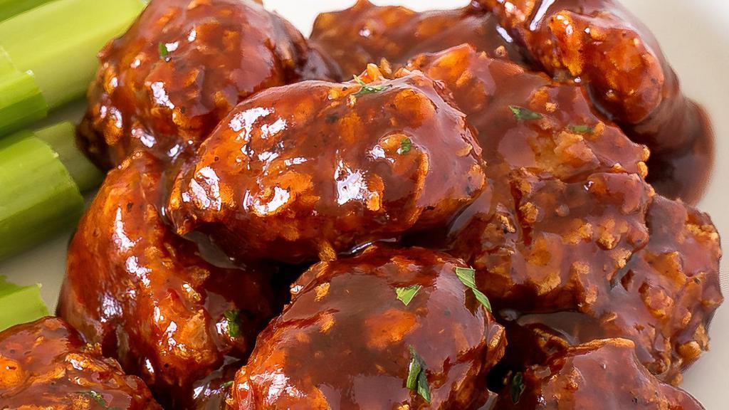 Bang Bang Chicken Bites · All white meat chicken lightly coated deep fried & tossed in choice of sauce.