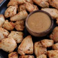 Bang Bang Grilled Chicken Bites · All white meat chicken, grilled, & tossed in choice of sauce.