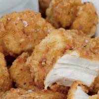 Dippin' Chicken Bites · All white meat chicken lightly coated, deep fried, & served with choice of dipping sauce.