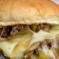 Mushroom Steak & Swiss Sami · Cheesesteak on a BUN!  Ribeye steak, mushrooms, & swiss cheese on a soft sandwich roll with ...