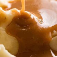 Mashed Potatoes And Gravy · Creamy Mashed Potatoes topped with Gravy!