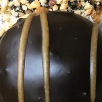 Gluten Free Peanut Butter Bomb! · A chocolate candy bar bottom. Topped with peanut butter ganache and a mound of chocolate mou...