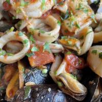 Mediterranean Zuppa Di Pesce · Jumbo shrimp, clams, mussels, calamari and scallops combined in a zesty marinara sauce or ga...