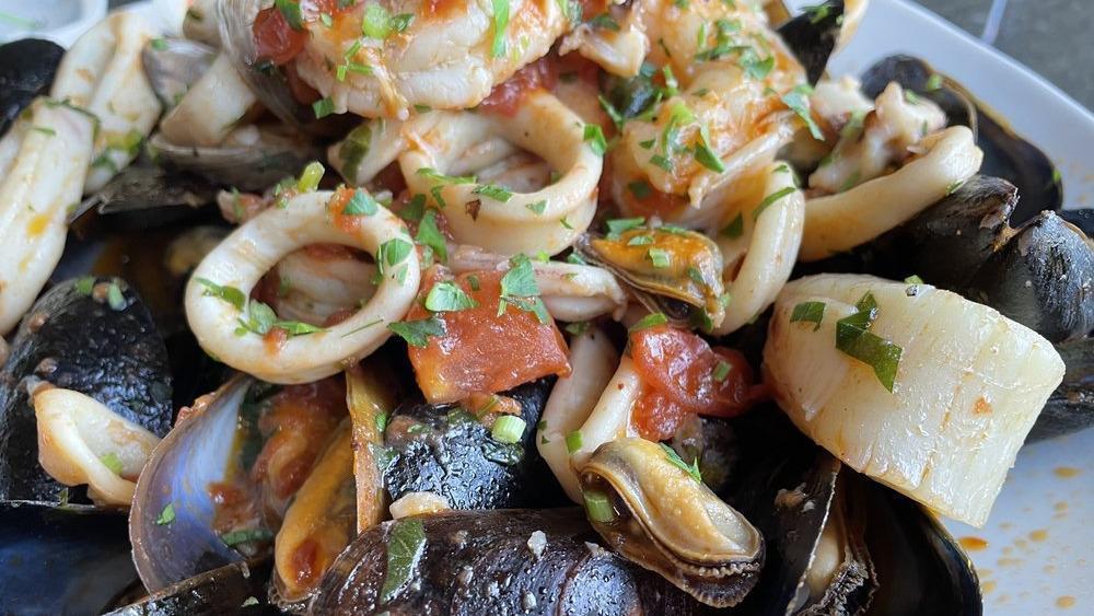Mediterranean Zuppa Di Pesce · Jumbo shrimp, clams, mussels, calamari and scallops combined in a zesty marinara sauce or garlic white wine sauce.