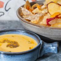 Queso Dip · Gluten-free. Vegan. Housemade cheese sauce and mojo Verde.