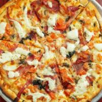 North End Pizza · Fresh tomatoes, prosciutto, olive oil, fresh garlic, basil and fresh mozzarella.