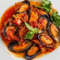 Mussels Pomodoro · Fresh steamed mussels in a tomato and herb style sauce.