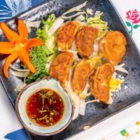 Pan Fried Or Steamed Dumplings (6) · 