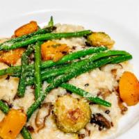 Risotto Vegetarian · Vegetarian mushroom risotto served with Parmesan cheese