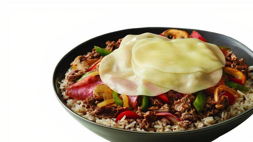 Steak Bomb Bowl Medium · Choice of Freshly Grilled Steak or Chicken, Genoa Salami, Capicola, Grilled Onions, Peppers, Mushrooms, Provolone Cheese. Served over our Rice & Grains Blend with quinoa, Colusari red rice, red jasmine rice, baby lentils and long-grain rice.