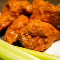 Chicken Wings · Hot jumbo wings lightly breaded and sauced to perfection, with your choice of Mambo sauce, F...