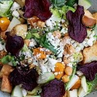 Roasted Beet Salad · goat cheese, red and golden beets seasoned with thyme salt, orange citrus vinaigrette & cand...