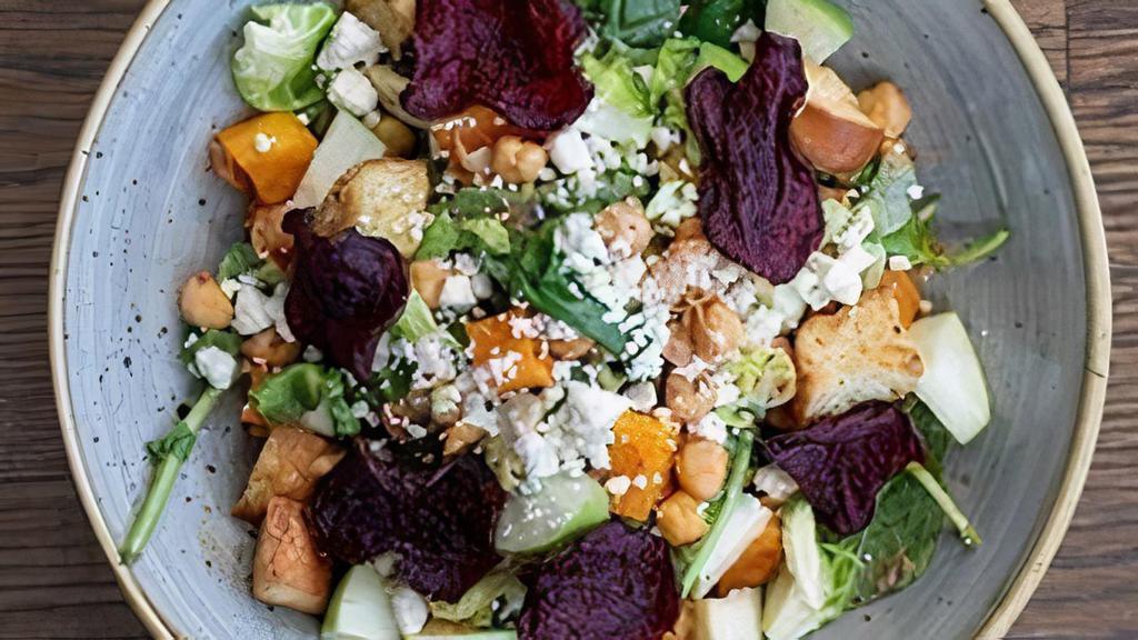 Roasted Beet Salad · goat cheese, red and golden beets seasoned with thyme salt, orange citrus vinaigrette & candied walnuts