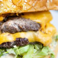 Bluejacket Double Burger · two 1/4 lb beef patties, dill pickles, american cheese, grilled onions, lettuce, million isl...