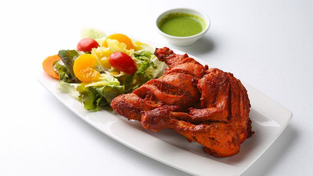 Tandoori Wings · Spicy tandoori chicken wings that are grilled to perfection with yogurt, lemon juice, ginger, garlic, garam masala, red chili powder, and turmeric.