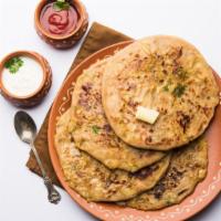 Paratha (2 Pieces) · Indian flatbread made from whole wheat shallow fried.
