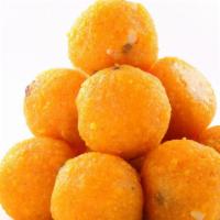 Motichoor Ladoo (3 Pieces) · Mouth-watering cluster of tiny pearl beads made from gram flour and semolina in pure butter ...