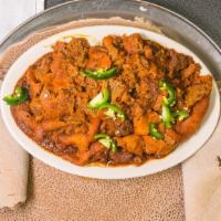 Tibs Firfir · With Ethiopian butter, ground chili pepper, and cottage cheese, served raw, medium or well d...