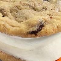 Ice Cream Cookie Sandwich · Our vanilla custard sandwiched between 2 chocolate chip cookies.