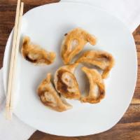 Fried Or Steamed Dumplings (8 Pcs) · Chicken with vegetable.