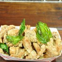 Popcorn Chicken · Deep-fried special season marinated chicken dices, choice of spicy.
