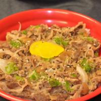 Beef Don · Savory and juicy sliced beef and onions and placed over white rice.