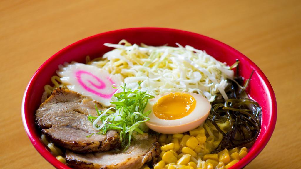 Heaven Ramen · Authentic Japanese ramen in house special pork broth, topped with house-made cha-shu pork, marinated soft egg, fish cake, seaweed, corn, cabbage, and bean sprouts.
