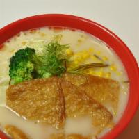 Vegetable Ramen · Vegetable broth boiled ramen, topped with tofu skin, broccoli, corn, cabbage, and bean sprou...