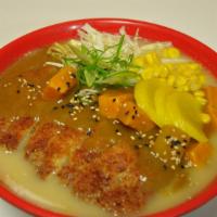 Katsu Ramen · Deep-fried pork sinks in house special pork broth with ramen, lightly mixed in some curry, t...