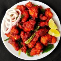 Gobi Manchurian · Cauliflower fritters tossed in a tangy Chinese sauce with a dash of Indian spice.