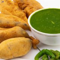 Mirchi Bajji (5 Pcs) · Stuffed hot chilies dipped in a spiced batter and deep fried.