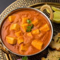 Paneer Tikka Masala · Marinated cottage cheese cubes cooked in a spiced tomato gravy.