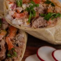 Super Burrito** · Extra large burrito in a flour tortilla w/ cheese, choice of meat, choice of beans, rice, pi...